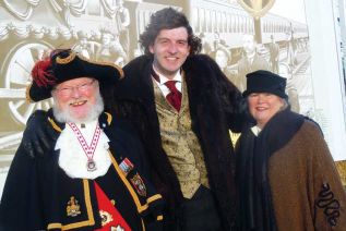 Centre - Sir John A. MacDonald (Paul Dyck) poses with Town Crier Paddy O'Connor and Frontenac Heritage Festival chair and founder Janet Gutowski prior to the festival's opening on Friday, February 13